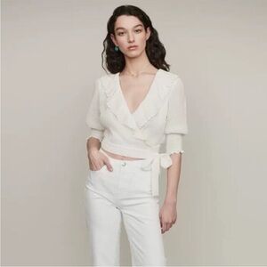 Maje Lusty cropped ruffled Swiss-dot wrap blouse